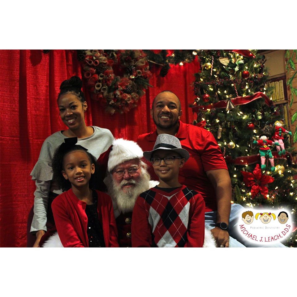 African_American_Family_Visiting_Santa_Pediatric_Dentist
