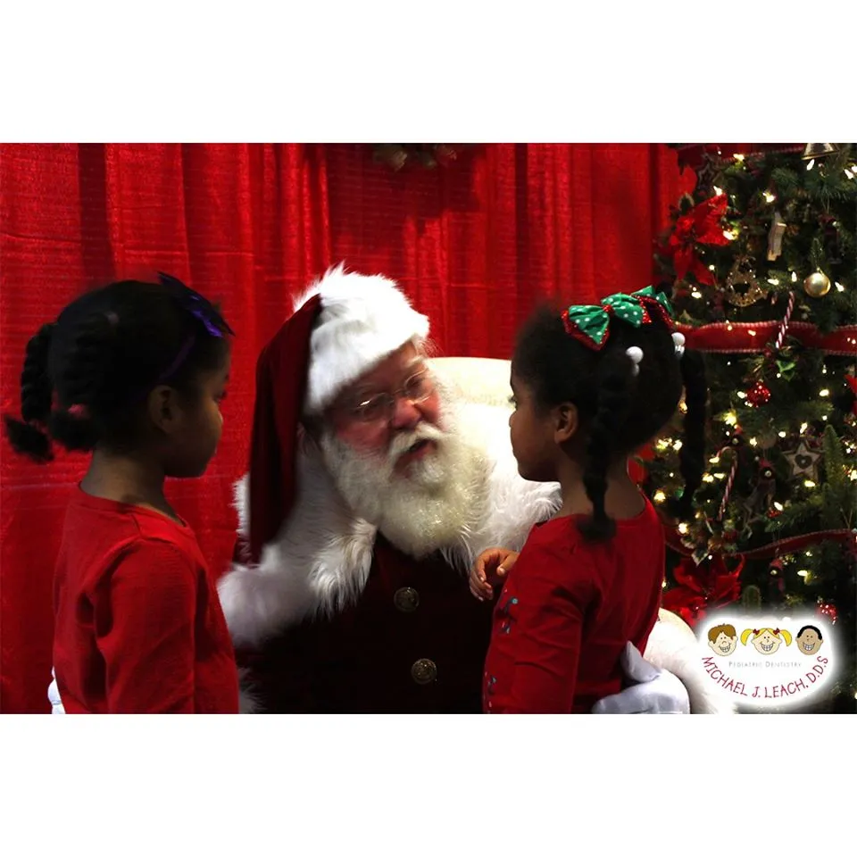 African_American_twins_Telling_Santa_what_they_want