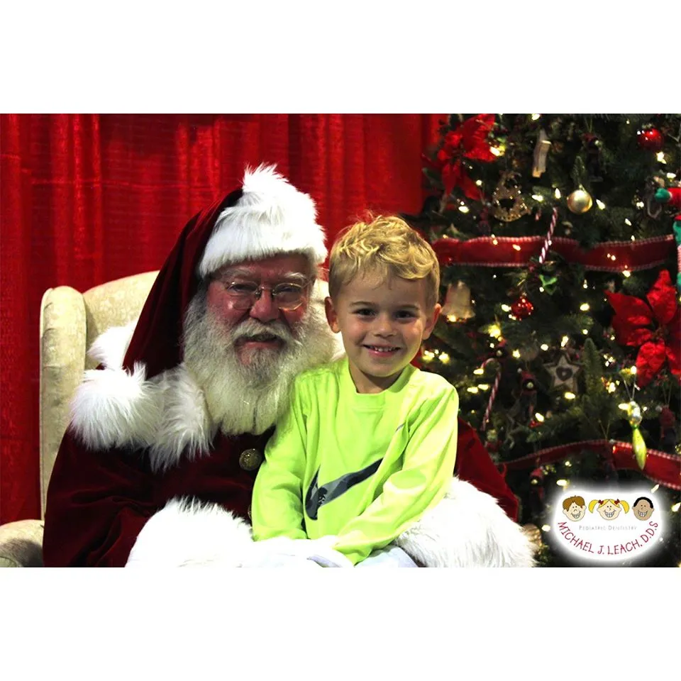 smiling_young_blonde_boy_with_Santa
