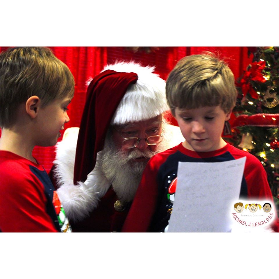 Brothers_reading_Christmas_list_to_Santa